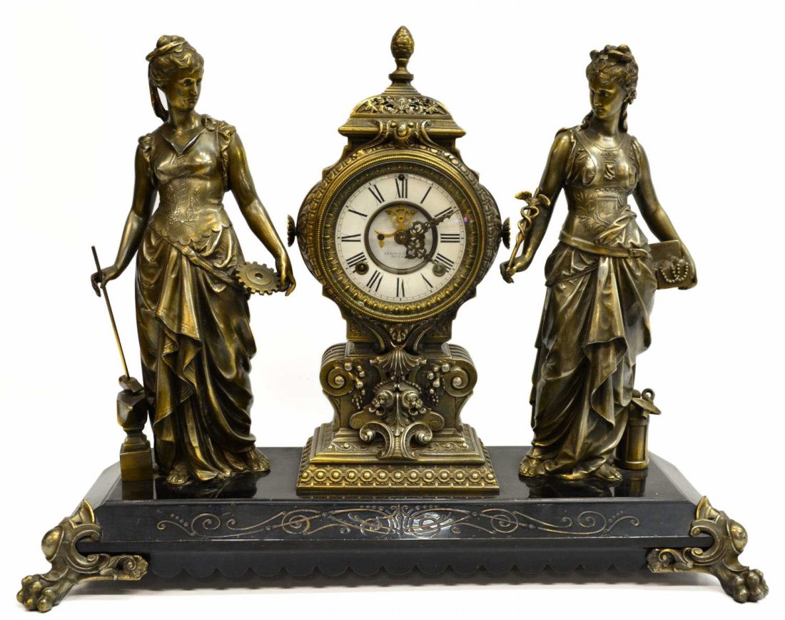 ANSONIA INDUSTRIAL & ARTS FIGURAL MANTLE CLOCK: American figural patinated metal mantle clock, Ansonia Clock Company, patented 1881, the drum form clock movement in fancy case with porcelain chapter ring, Roman numerals and open escapement, time an