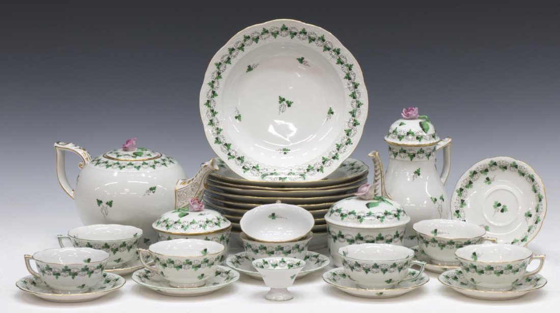 (31)HEREND PORCELAIN PARSIL PATTERN DINNERWARE: (set of 31) Herend porcelain partial dinnerware, 'Parsil' pattern, both gilt and green rims, comprising: (10) shallow dinner bowls, 10”diam; (8) tea cups, two with green rims, 2"h, 4"diam; (8) sauce