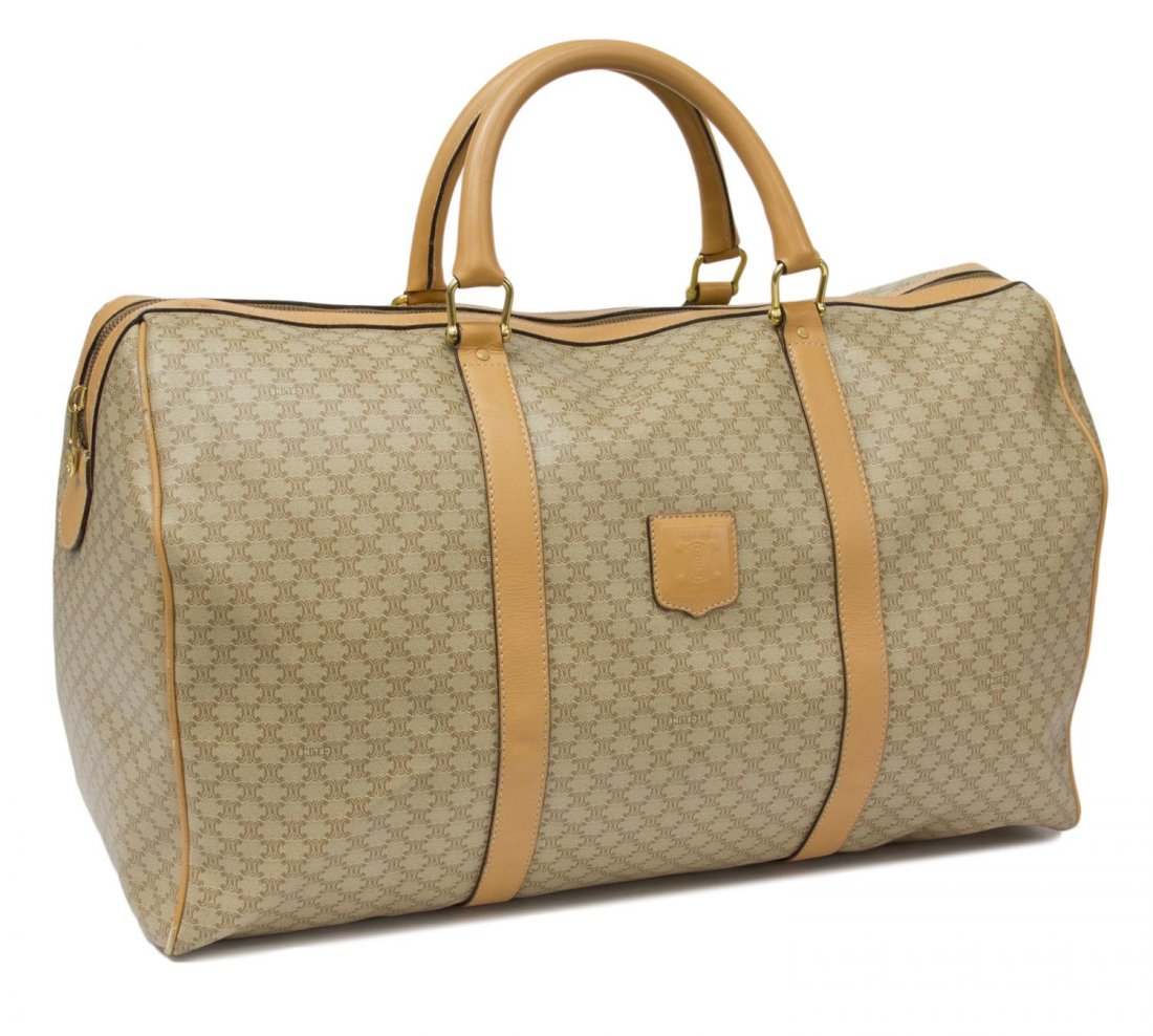 CELINE TRAVEL DUFFLE BAG IN MONOGRAM CANVAS: Celine travel bag in beige monogram canvas, tan leather double handles and trim, single zipper closure, gold tone hardware, tan interior with single side zipper pocket, minor wear to exterior, bag: ap