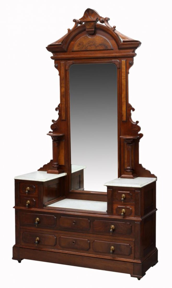 AMERICAN RENAISSANCE REVIVAL MIRRORED DRESSER: American Renaissance Revival dresser, c. 1880, having an arched cornice over a drop center mirror flanked by candle stands with tapered supports, marble tops the center and two side pedestals with two