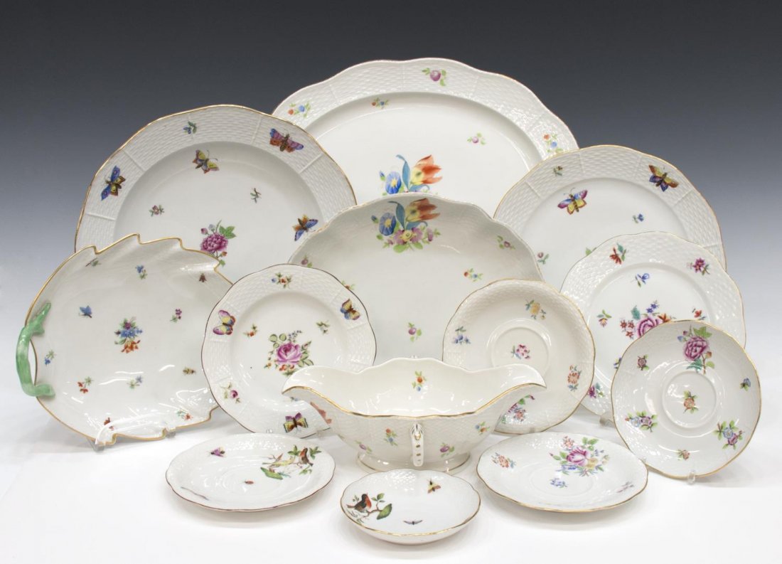 (13) HEREND PORCELAIN FLORAL DINNERWARE, ASSORTED: (lot of 13) Collection of Herend handpainted porcelain in various patterns including: (2) in a floral and butterfly motif, basket weave border and gilt trim, with one dinner plate, 11.5"diam, one lunc