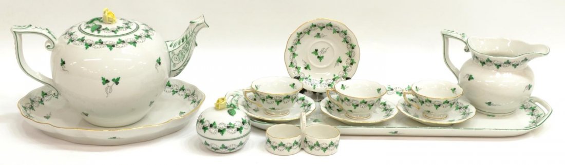 (13) HEREND PORCELAIN PARSIL PATTERN DINNERWARE: (set of 13) Herend porcelain serviceware, 'Parsil' pattern gilt and green rims, comprising: (3) espresso cups, 1.5"h, 3"diam; (4) espresso saucers, 4.5"diam; (1) teapot with yellow rose finial, slight