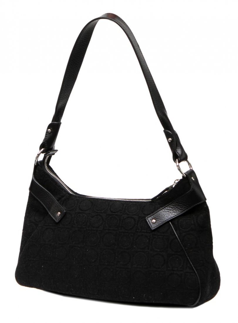 SALVATORE FERRAGAMO MONOGRAM FABRIC & LEATHER BAG: Salvatore Ferragamo monogram shoulder bag in black, single black leather strap, silver tone hardware, green interior with side zipper pocket, bag: approx 6.5"h, 12"w, 3"d, .75lbs Start Price: $80.00