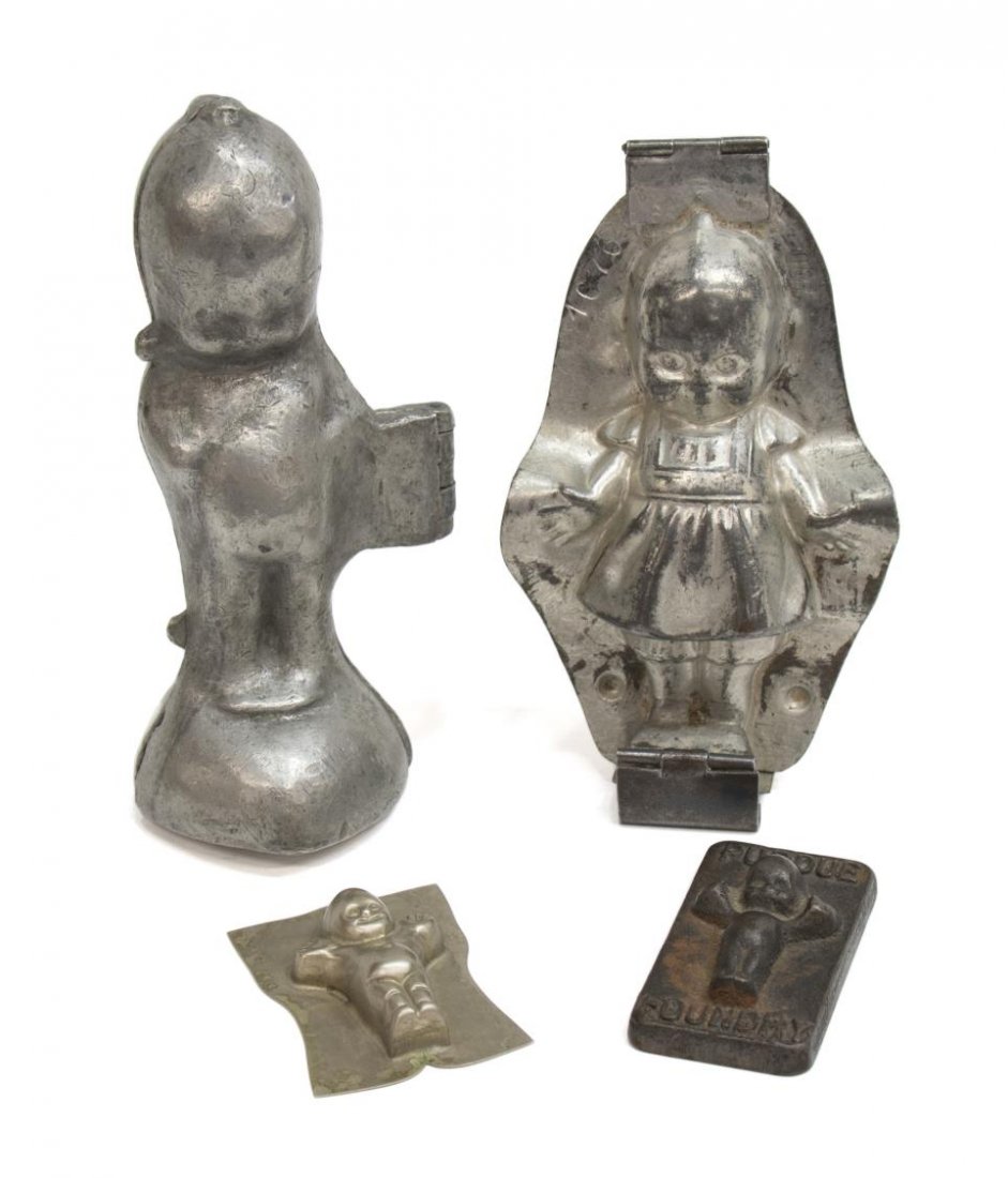 (4) KEWPIE CHOCOLATE & BAKING MOLDS: (lot of 4) Kewpie items: (2) Kewpie chocolate molds, one pewter dated March 4, 1913, one steel, largest: 6.25"h; (1) small tin Kewpie baking mold, 2.5"h, 1.75"w, (1) cast iron Kewpie paperweight marke