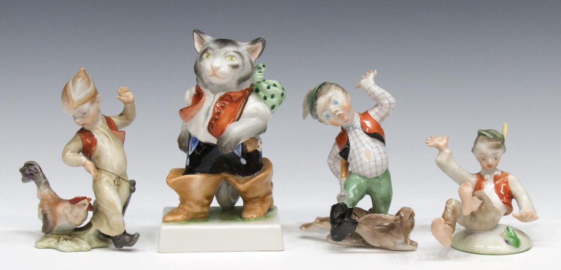 (4) COLLECTION OF HEREND PORCELAIN FIGURES: (lot of 4) Collection of Herend porcelain figures, Hungary, comprising: (1) Puss in Boots, 6"h; (1) Boy with Rooster, 5"h; (1) Hunter Boy and the Frog, 3"h; (1) Hunter Boy with Rabbit, 4.5"h; overall