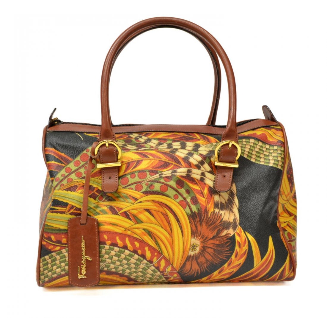 SALVATORE FERRAGAMO COATED CANVAS & LEATHER BAG: Salvatore Ferragamo handbag, coated canvas printed in a feather and foliate motif, brown leather straps and trim, gold tone hardware, black interior with single side zipper pocket, slight wear, bag: a