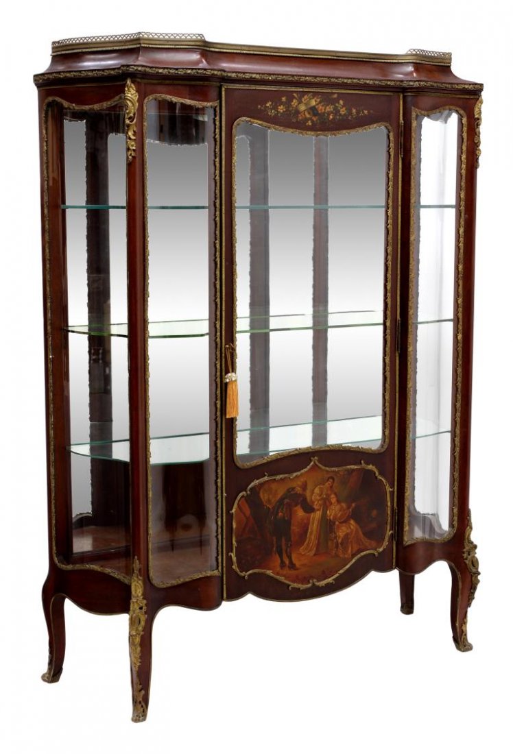 VERNIS MARTIN CURVED GLASS DISPLAY CABINET: Vernis Martin style vitrine, c. 1920, having a pierced metal grill over the downward sloped cornice, a central glass door, the lower part with a painted scene, flanking glass panels, opening to the mi