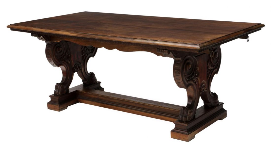 ITALIAN CLAW FOOT DINING TABLE: Baroque style dining table, Italy, late 19th c., a rectangular top with scrolled supports terminating in large claw feet raised on a trestle base, 31.25"h, 78.5"l, 39.5"d Start Price: $300.00