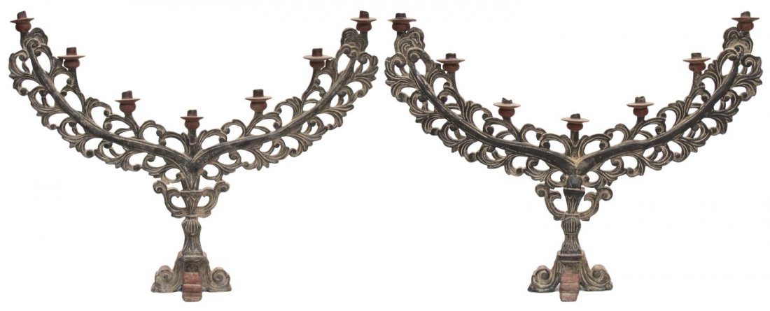 (2) ANTIQUE RELIGIOUS ALTAR CANDELABRAS: (lot of 2) French Colonial carved polychrome wood altar candelabras, early 20th c., each pierce carved foliated form holding seven lights, varied size approx. 23.5"h, 30"w, 6"d, 5.75lbs Start Price: $