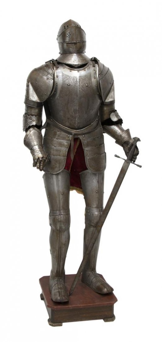 VINTAGE SPANISH SUIT OF ARMOR: Vintage full display suit of armor, Northern Spain, engraved steel including knights, dragons and foliage, a 45" replica sword with the name Carlos V (Holy Roman Emperor, King of Spain, b.1500-d.1568)