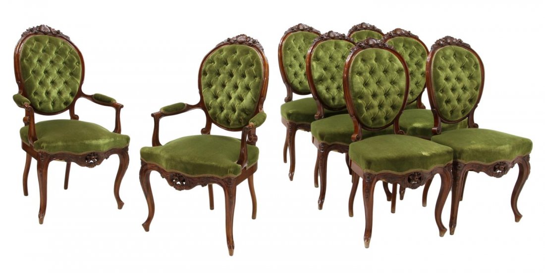 (8) LOUIS XV STYLE DINING CHAIRS, SPAIN: (lot of 8) Louis XV style dining chairs, Northern Spain, first half 20th c., each having a shell and foliate carved frame surrounding an oval back upholstered in buttoned green fabric, the seat with m