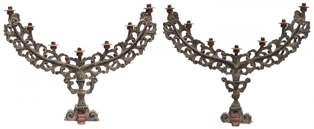 (2) ANTIQUE RELIGIOUS ALTAR CANDELABRAS: (lot of 2) French Colonial carved polychrome wood altar candelabras, early 20th c., each pierce carved foliated form holding seven lights, varied size approx. 23.5"h, 30"w, 6"d, 6.25lbs Start Price: $