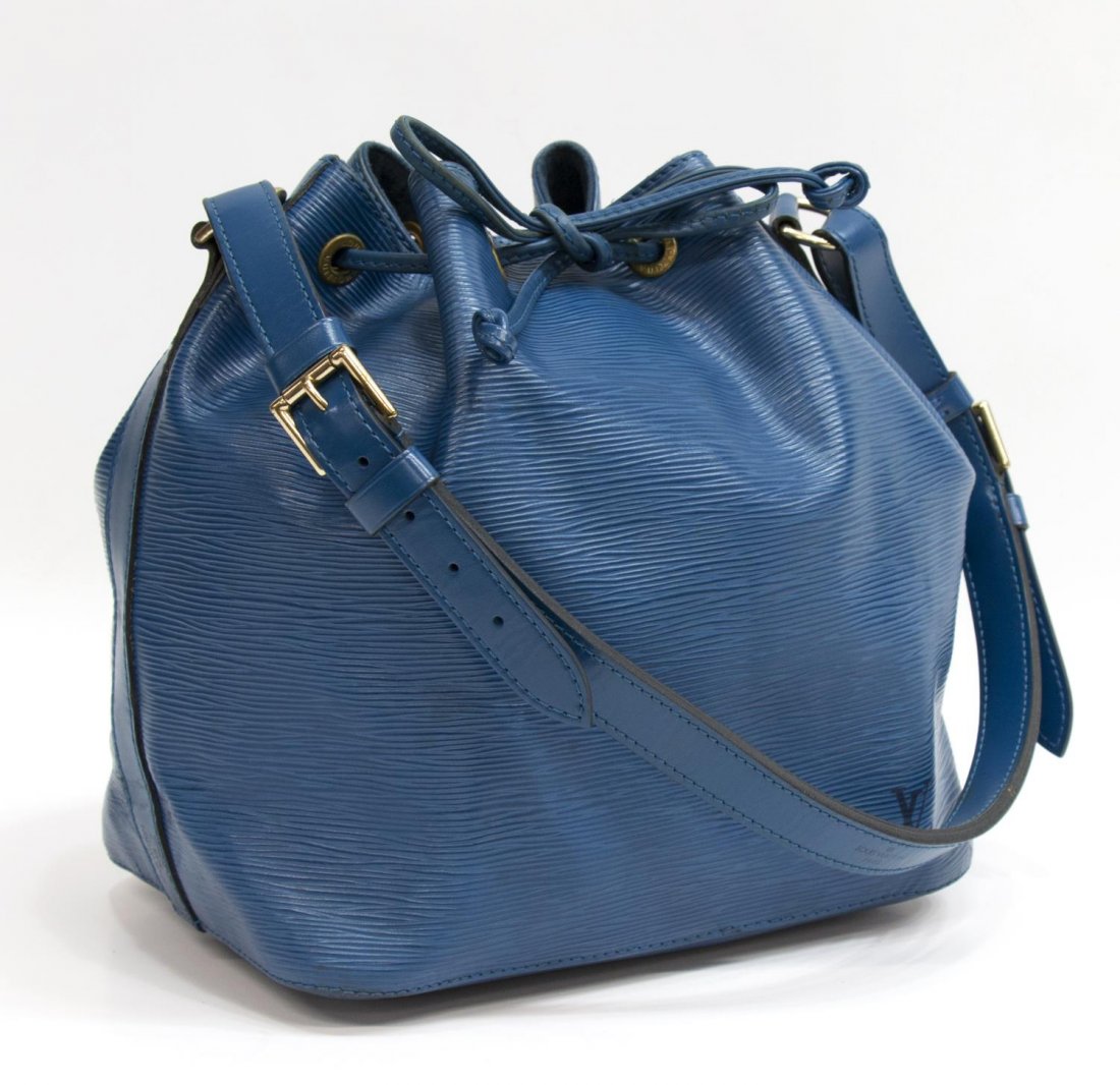 LOUIS VUITTON BLUE EPI NOE DRAWSTRING SHOULER BAG: Louis Vuitton "Noe" drawstring bag in blue Epi leather, adjustable shoulder strap, some stains to alcantara lined interior, bag: approx 10.25"h, 15"w, 1.25lb Start Price: $250.00