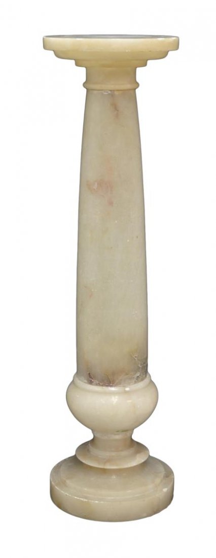 SPAIN ALABASTER PEDESTAL: Alabaster pedestal having a round top rising on a tapered column, Spain, set on a stepped circular pedestal, separates into three pieces, discoloration and chips to edges, 43.75"h, 12"diam Start Price