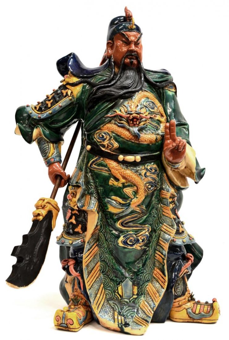 LARGE CHINESE GLAZED CERAMIC FIGURE, GUAN GONG: Chinese polychrome ceramic figural sculpture, a depiction of Guan Gong, dressed in dragon robe holding staff, mark on interior base as pictured, 23"h, 20.25lbs Start Price: $200.00