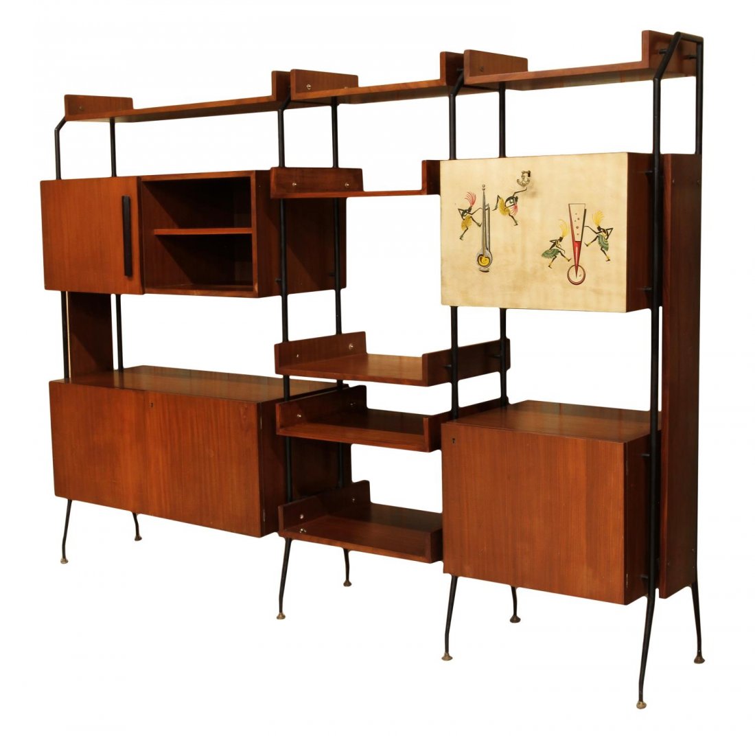 ITALIAN MID-CENTURY MODERN BOOKCASE WALL UNIT: Italian mid-century modern wall unit bookcase, c. 1960, black iron frame holding an assortment of rectangular cabinets and shelving, one unit with drop down door in cream paint, depicting dancing and 
