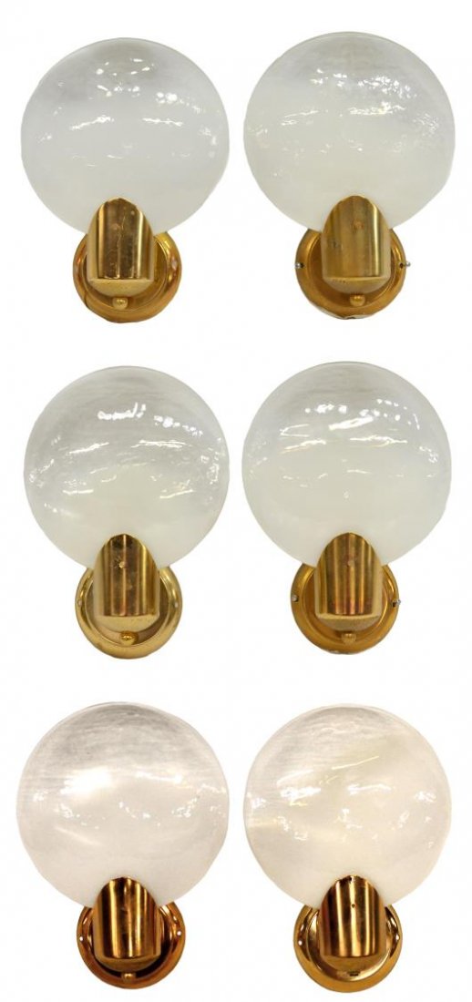 (6) ITALIAN MODERN ART GLASS WALL SCONCES, MAZZEGA: (6) Italian modern art glass sconces, design by Mazzega, No. 6, c. 1960's / 1970, translucent to opaque white Murano glass cover enclosing light, gilt metal hardware, some chipping to gilt and surface
