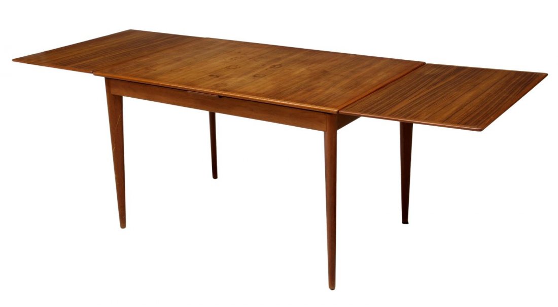 ITALIAN MID-CENTURY MODERN DRAW LEAF TABLE: Italian mid-century modern teakwood extension dining table, c. 1960, the rectangular top over two draw leaves, raised on tapered legs of cylindrical form, some spotting to top, closed: 28.5"h, 45"w, 3