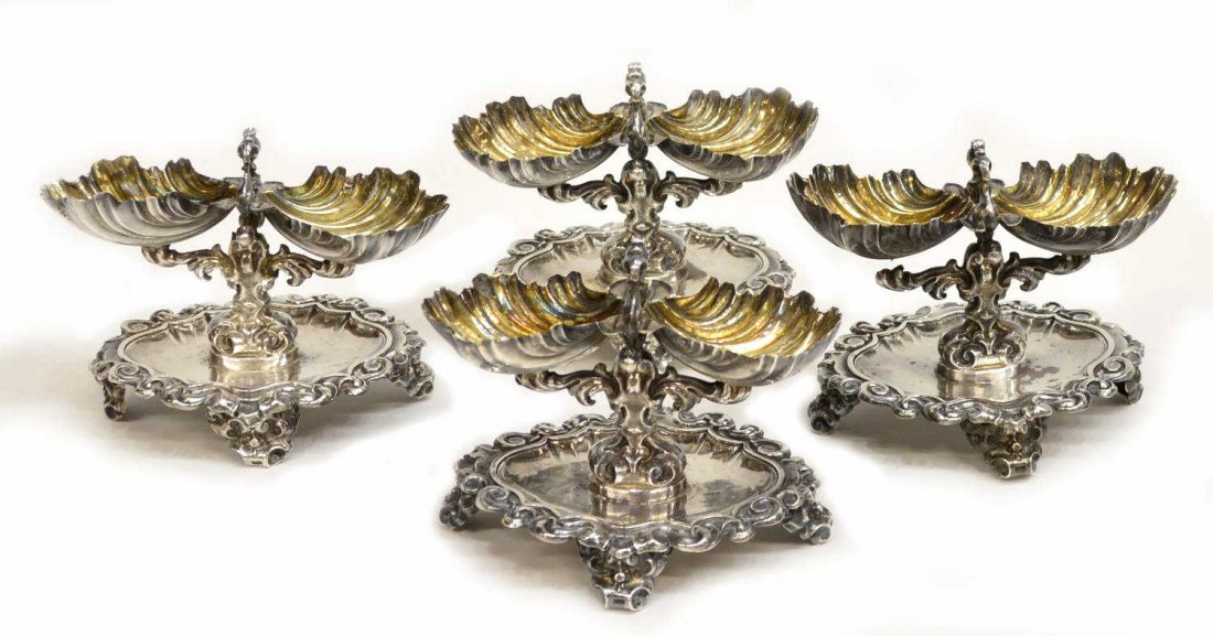 (4) FRENCH STERLING DUAL SHELL SALT DISHES: (set of 4) French sterling silver salts, each having dual shell form bowl with gilded interior, on a branch form standard, oval base with scrolled border, raised on four feet, Minerva head hallmark, s