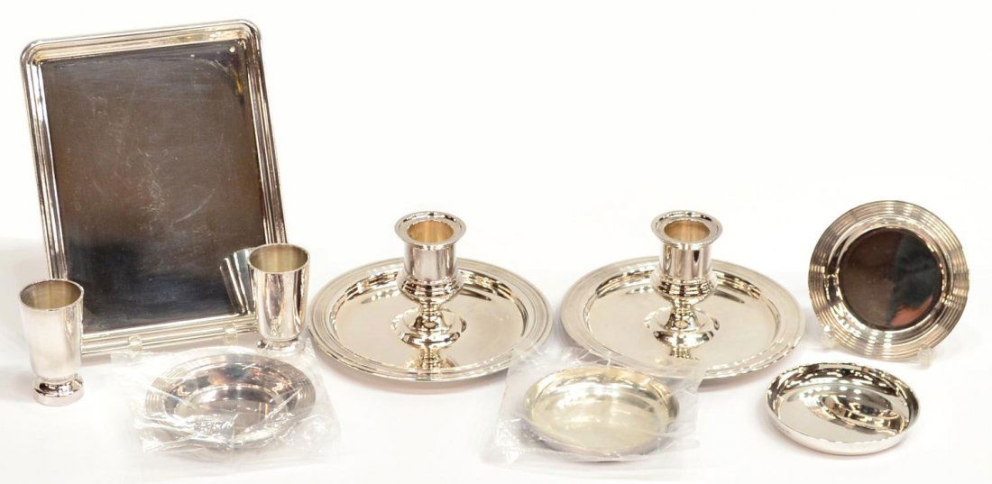 (9) CHRISTOFLE SILVER PLATE ITEMS: (lot of ) Christofle silverplate pieces: (1) tray, 6"w, 4.75"d; (2) candleholders, 2.25"h, 4.75 diameter; (2) circular butter pats, 3"diameter; (2) circular butter pats, 2.75"d; (2) liqueur tumblers,
