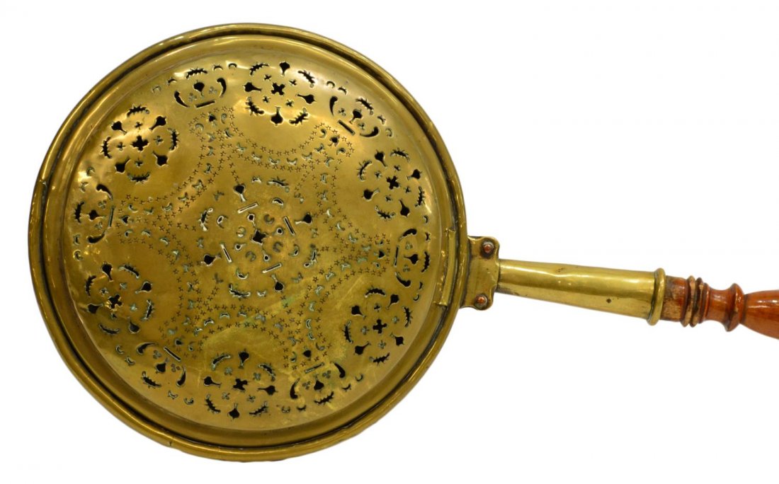ANTIQUE CONTINENTAL BRASS BED WARMER: Antique brass bed warmer, 19th c., turned stick handle terminating in a copper pan with geometric and star engraved hinged top, 36.5"h, 3lbs Start Price: $60.00