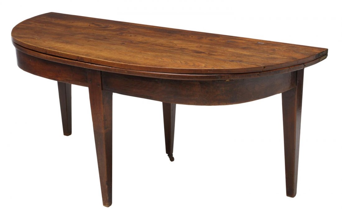 LARGE FRENCH PROVINCIAL DEMILUNE FOLD TOP TABLE: Large French provincial demilune oak fold top table, 19th c., a plank top opening to 57"d rising on a thick bentwood skirt with tapered squared legs, peg joinery, 30"h, 69"w, 28.5"d Start Price: $300.