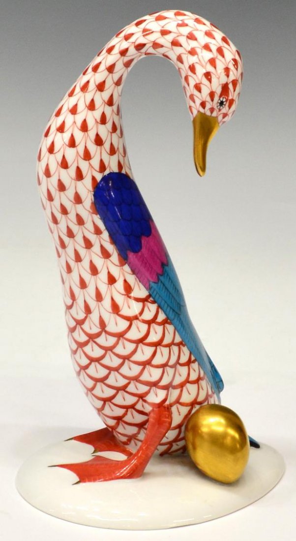 HEREND FISHNET PATTERN GOOSE WITH GOLDEN EGG: Herend porcelain goose with golden egg, Hungary, rust fishnet pattern with gilt accent, marks and incisions as pictured, 7.5"h, 1lbs Start Price: $80.00