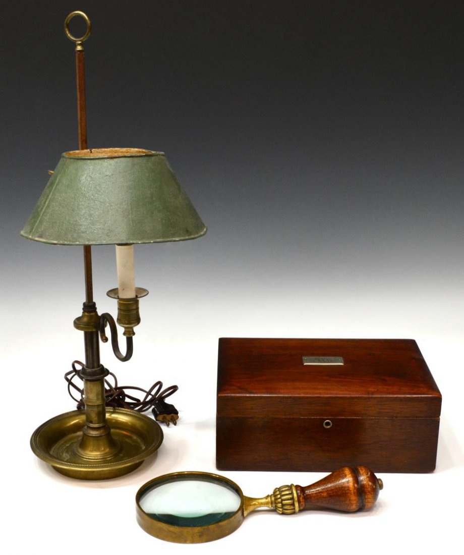 (3)ANTIQUE TOLE LAMP, WOODEN BOX, MAGNIFYING GLASS: (lot of 3) Collection of table items: (1) French tole lamp having a brass base, single light, green shade, shade paint loss to interior, overall: 22"h; (1) antique wood box having inset monogramed sil