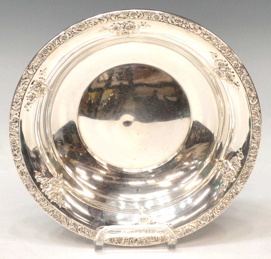 AMERICAN REPOUSSE FLORAL BOWL, WATSON COMPANY: American sterling silver center bowl, Watson Company, #3219, repousse floral rim and sprays on slope shoulder, small dent at central well, 9"diam, 7.49ozt Start Price: $60.00