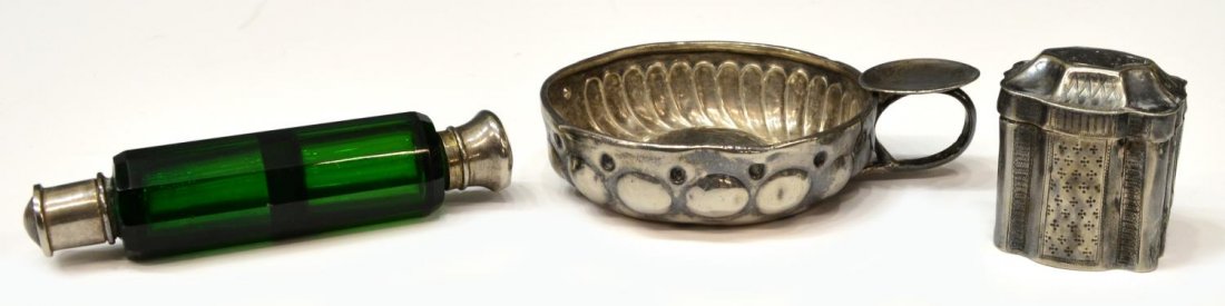 (3) VICTORIAN SCENT BOTTLE & SILVER METAL ITEMS: (lot of 3) A Victorian green glass perfume bottle, two-sections with silver tone lids, dents, 4"l; (1) round dish with thumb rest, mark as pictured, 3.25"diam; (1) small box, marks as pictured, tear t