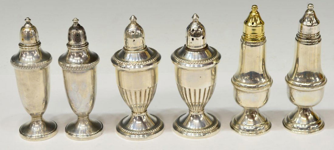 (6) WEIGHTED STERLING SILVER SALT & PEPPER SHAKERS: (3 sets) Weighted sterling silver salt and pepper shakers: (2) Fisher sterling with gadrooned band, small dents, one lid not opening, 4.75"h; (2) Reed and Barton, one with gilt lid, glass lined, 5"h;