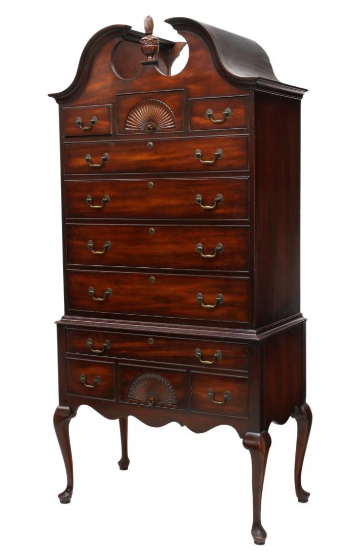 HENREDON GEORGIAN STYLE CHEST ON STAND: Henredon Georgian style mahogany chest on stand, with broken arch pediment over seven drawers, the base section with four drawers on cabriole legs, two drawers with fan form faces, 78"h, 38.25"w, 21"d