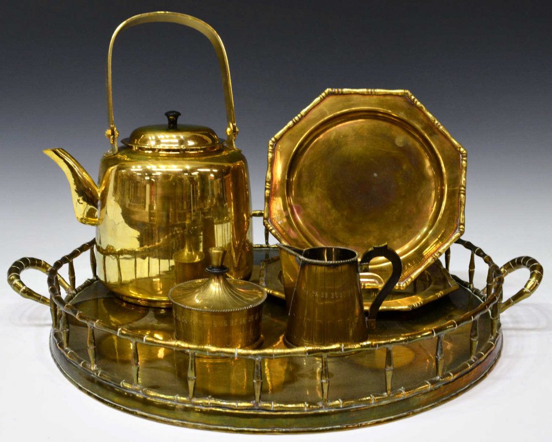 (6) ERNST SOHN DESIGN & OTHER BRASS TABLE WARE: (lot of 6) Collection of brass table and service items, comprising: (1) large handled tray, handles and sides decorated to resemble bamboo, 3"h, 24.5"w; (2) dessert plates with bamboo designed edges,