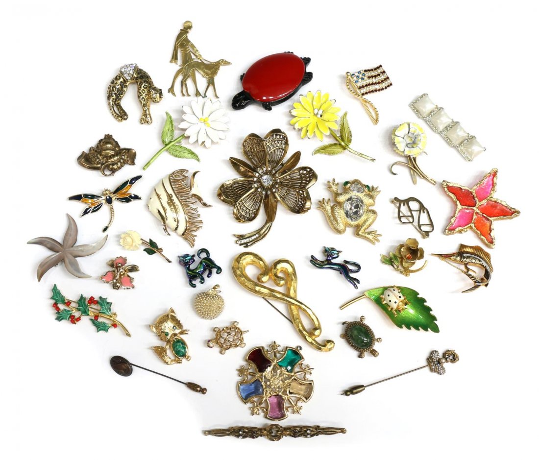 COLLECTION VINTAGE & OTHER PINS & BROOCHES: (lot) Collection of vintage and other brooches and pins, various shapes and materials, examples include (1) Hattie Carnegie brooch, a green enamel leaf surmounted by a moving lady bug,, (1) red and bl