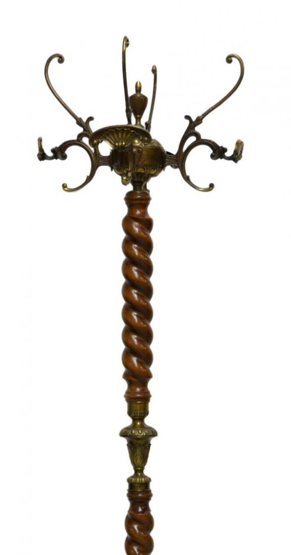 ITALIAN GILT BRASS SPIRAL TWIST STANDING HAT RACK: Italian brass and wood hall stand, 20th c., spiral column standard having brass center with egg and dart running trim and scroll relief, terminating in bulbous topper with acorn finial issuing four sc