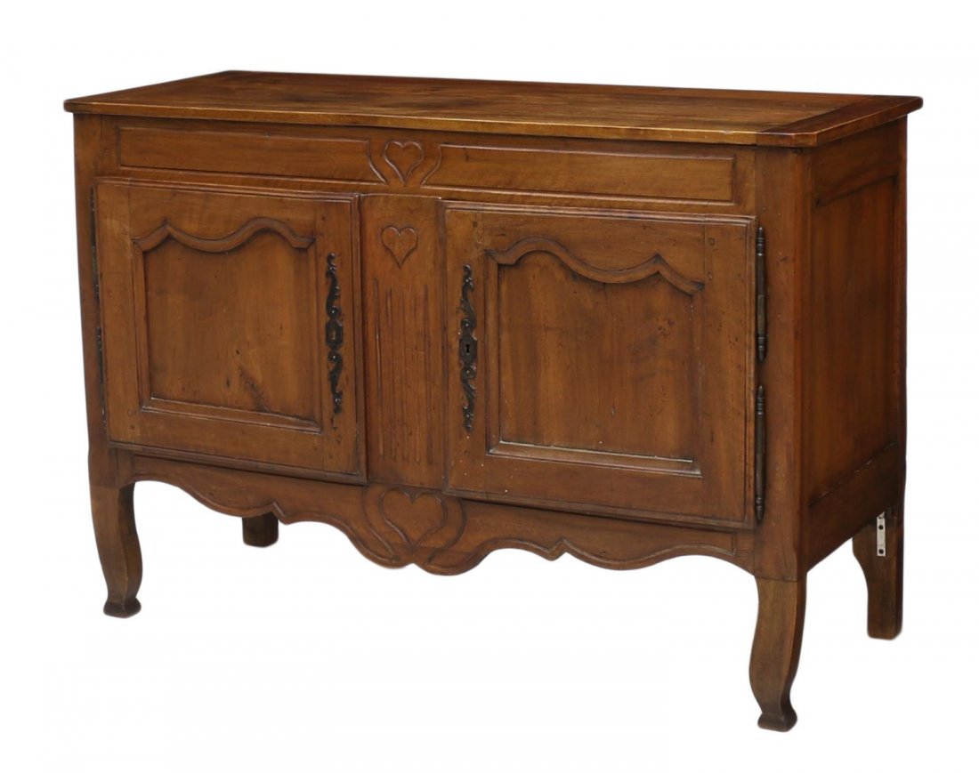 FRENCH LOUIS XV STYLE CHERRYWOOD SIDEBOARD: French provincial Louis XV style cherrywood sideboard, c. 1800, having a rectangular top over two doors, the frieze and a door accented with carved hearts, rising on cabriole legs with short block fee