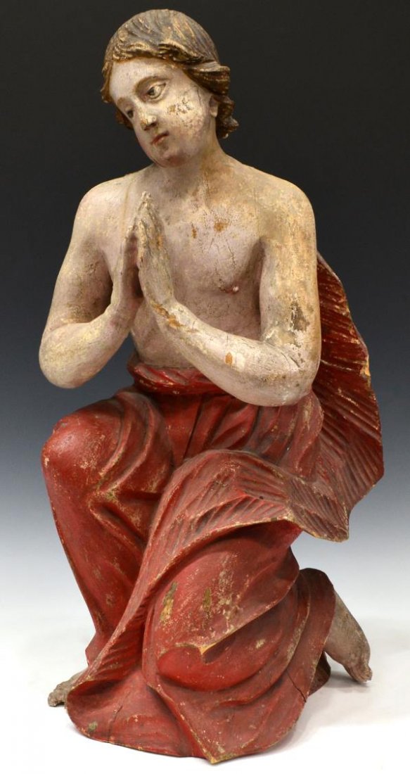 ANTIQUE RELIGIOUS WOOD CARVED ANGEL: Antique religious carved wood statue depicting an angel, Continental, 19th c., a figure kneeling in supplication, remnants of polychrome decoration, likely originally with wings, open on the back as i
