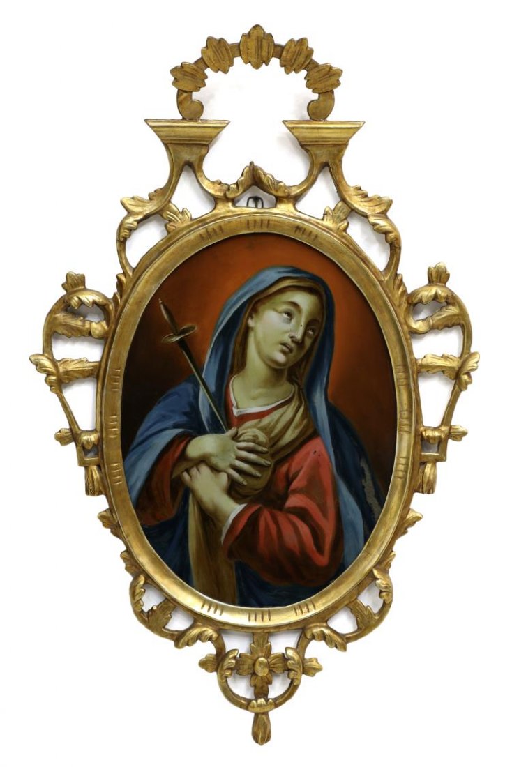 ANTIQUE SPAIN RELIGIOUS REVERSE PAINTING, GILT: Northern Spain religious reverse painting on glass depicting Our Lady of Sorrows, enclosed by an arched, gilded wood and gesso frame carved with open work foliate details, late 19th/ early 20th centur