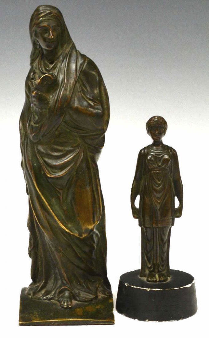 (2) ANTIQUE CONTINENTAL PATINATED BRONZE FIGURES: (lot of 2) Continental patinated bronze figures: (1) clad in full drapery, spotting, hole at neck, 9"h; (1) diminutive female standing upon a circular black base, wear to base, overall: 6"h; 4.75lbs t