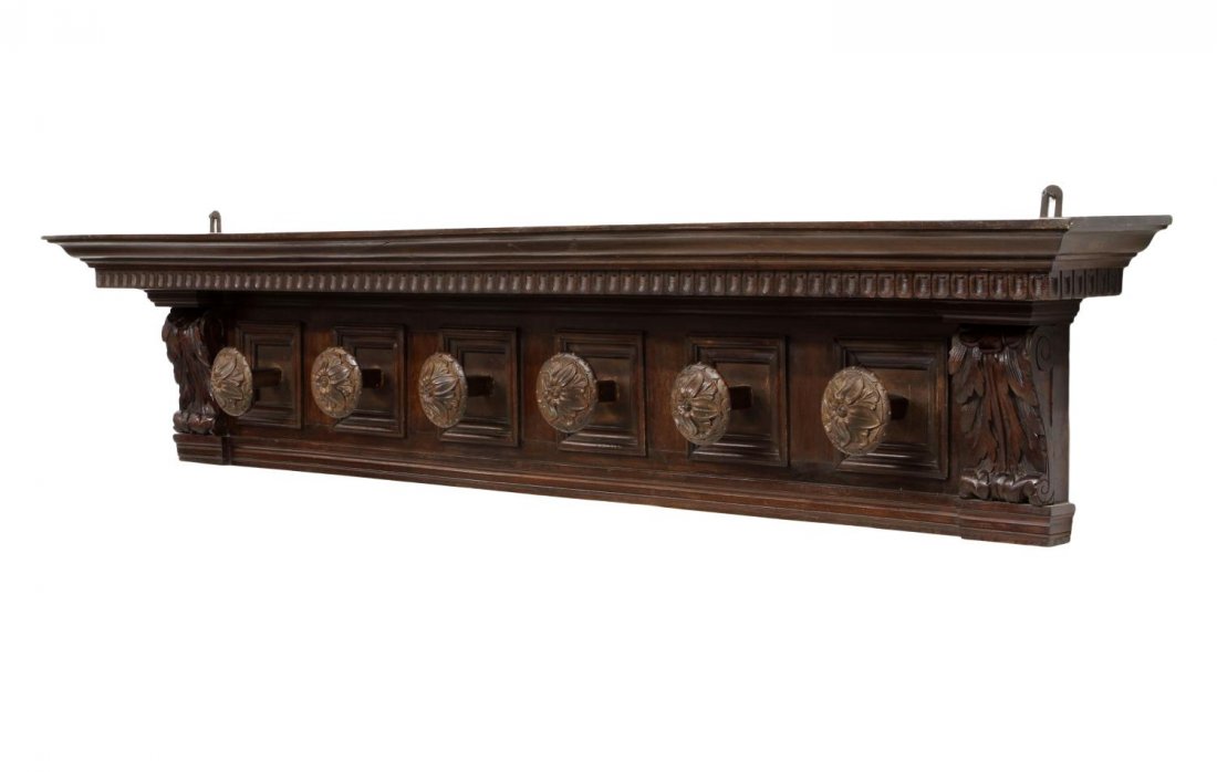 FRENCH RENAISSANCE REVIVAL COAT RACK: French coat rack, c. 1900, the protruding cornice over dentil moulding, six circular front coat hooks, 13.5"h, 68.5"l, 8"d Start Price: $80.00