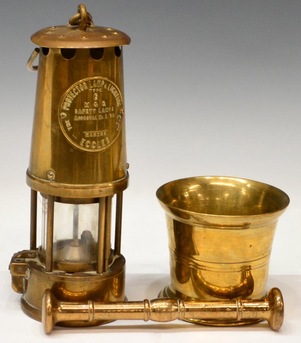 (3) VICTORIAN MINERS LAMP & BRASS MORTAR & PESTLE: (lot of 2) English brass articles (1) Victorian miner's lamp, Eccles The Protector Lamp and Lighting Co., 10"h; (1) pestle and mortar, pestle: 7.5"l, mortar: 3.75"h, 4.25"diam; 6.75lbs total Start Pri