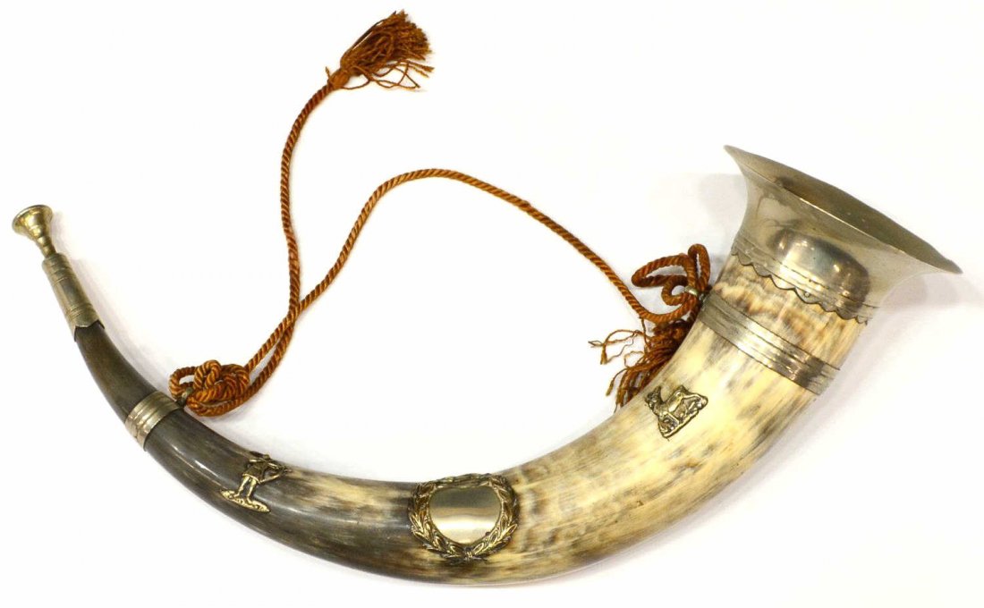ENGLISH HORN & SILVER METAL MOUNTED BUGLE: English bugle, fashioned from horn, silver tone mountings in relief, deer surmounting a wreath flanked by an archer and lone deer, 18"l; 1lbs Start Price: $150.00