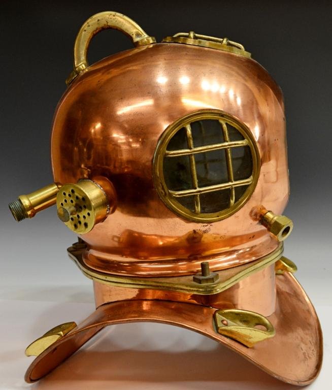 LARGE COPPER & BRASS MODEL OF A DIVING HELMET: Large model of a dive helmet, fashioned from copper and brass, lacking front glass panel, approx 18"h, 17.5"w, 13.25"d, 15.5 lbs Start Price: $0.00
