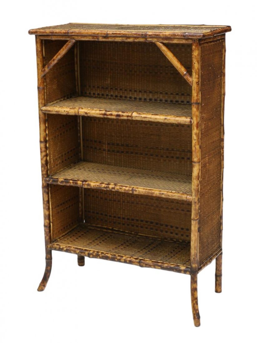 VICTORIAN BAMBOO FRAMED BOOKCASE: Victorian bamboo framed three shelf bookcase, c. 1900, rising on outward splayed legs, some loss to caned fabric, 41.75"h, 28.5"w, 13"d Start Price: $150.00