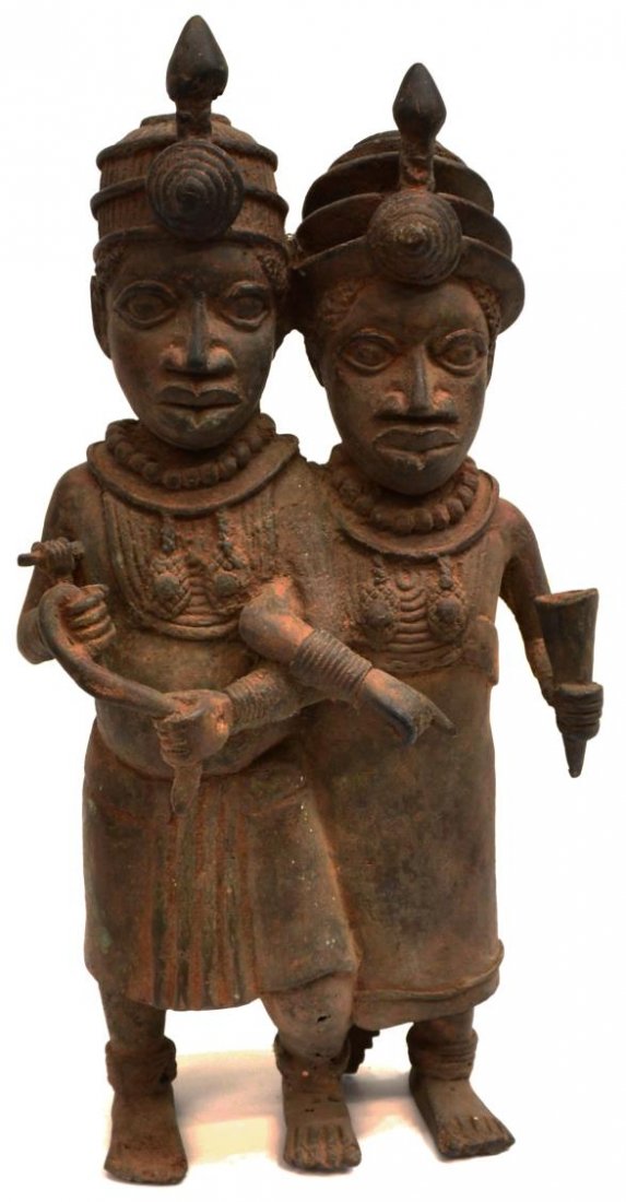 BRONZE BENIN ROYAL COUPLE DOUBLE SCULPTURE: Bronze double figure, Edo people, Benin, West Africa, 19th/20th c., in the form of a male and female figure dressed in ceremonial garb holding a snake and horn cup, loss to bronze at one foot, 15.5"h,