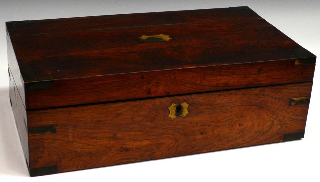 ANTIQUE ENGLISH METAL BOUND ROSEWOOD BOX: English rosewood lap desk having metal bound corners, inlaid cartouche and escutcheon, the interior lacking wood covers, 6"h, 17.75"l, 9.5"w, 6.5lbs total Start Price: $80.00