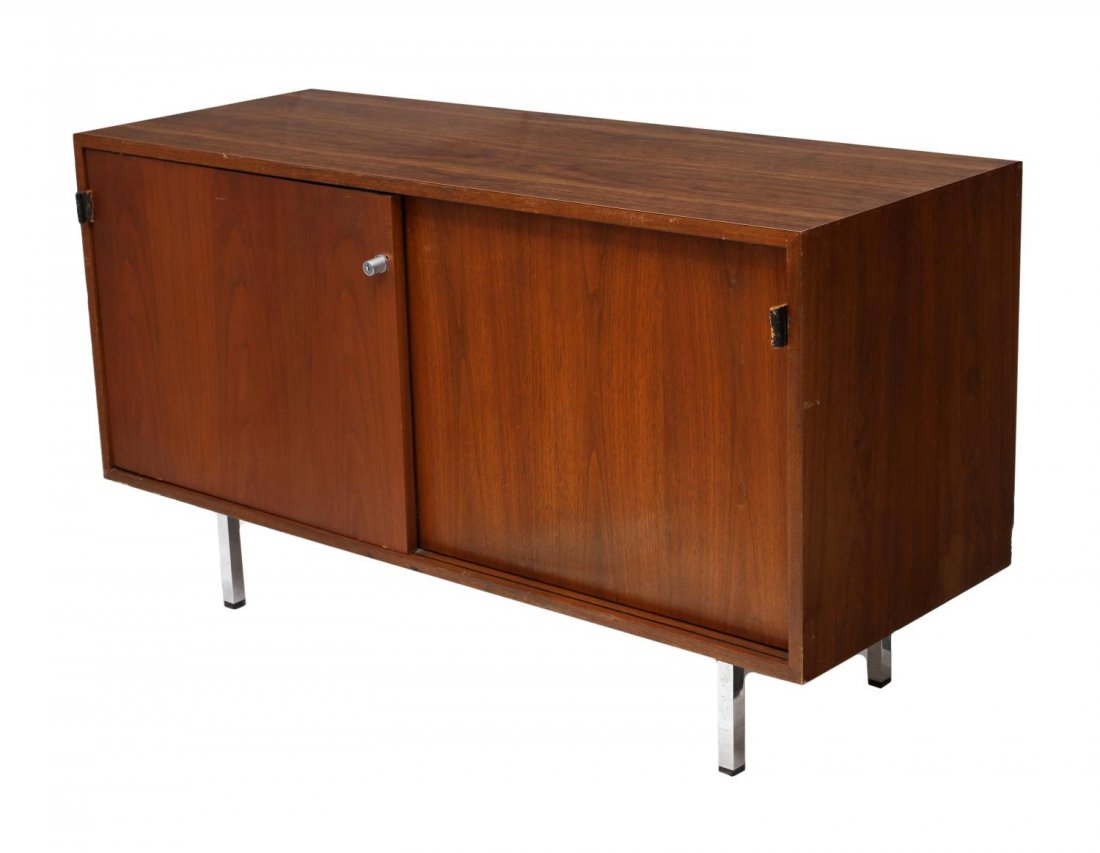 KNOLL LAMINATE & CHROME STEEL SIDEBOARD SERVER: Knoll diminutive sideboard or server, 1960's, having a laminate walnut finish top, two sliding doors opening to shelves, raised on squared chrome steel legs, retaining Knoll tag at underside, 27.25"h,