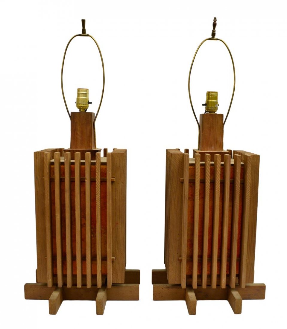 (2) AMERICAN MODERN DESIGN TABLE LAMPS,L.C. CAVITT: (pair) Modern design redwood table lamps,design by L.C. Cavitt (Texas, 20th c.) , square prism form lined with wooden slats and exposed main body, 20.5"h, 22.25lbs total Start Price: $80.00