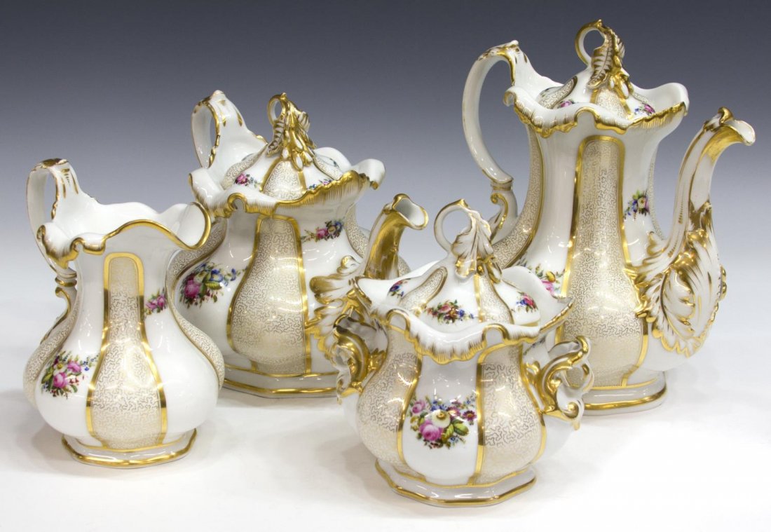 (4)TIELSH PARCEL GILT FLORAL PORCELAIN TEA SERVICE: (set of 4) Very fine German parcel gilt porcelain coffee and tea service, Tielsch Porzellan-Manufaktur, each of lobed form, the white ground with radiating gilt lappets alternately enclosing floral sp