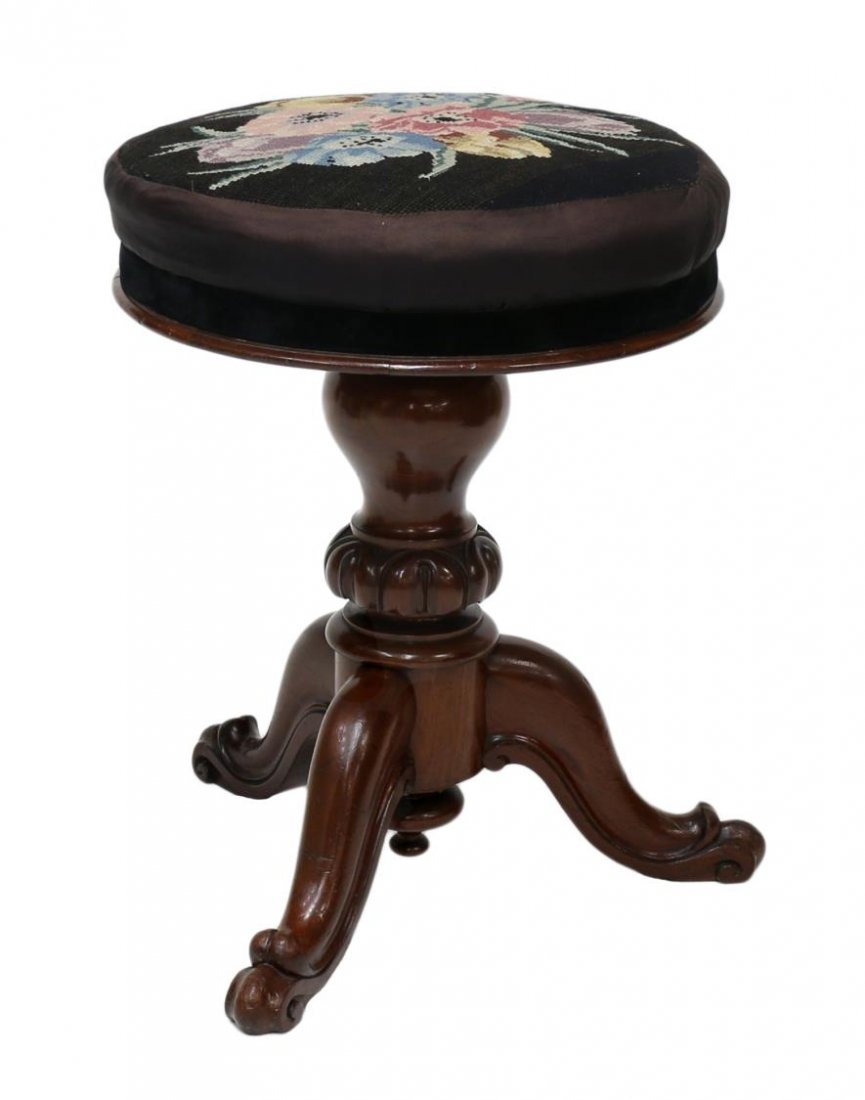 186206VICTORIAN MAHOGANY & NEEDLEPOINT PIANO STOOL: Victorian needlepoint seat rotating adjustable height piano stool on three scroll foot mahogany legs, 19"h, 15.5"w, 13.5"d Start Price: $100.00